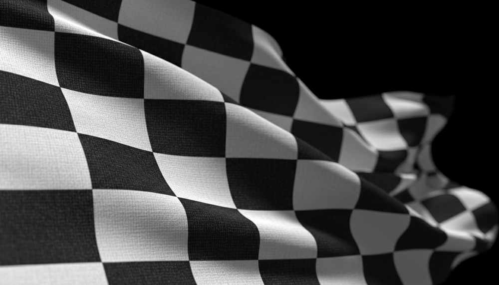 Chequered flag close-up on black