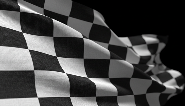 Chequered flag close-up on black